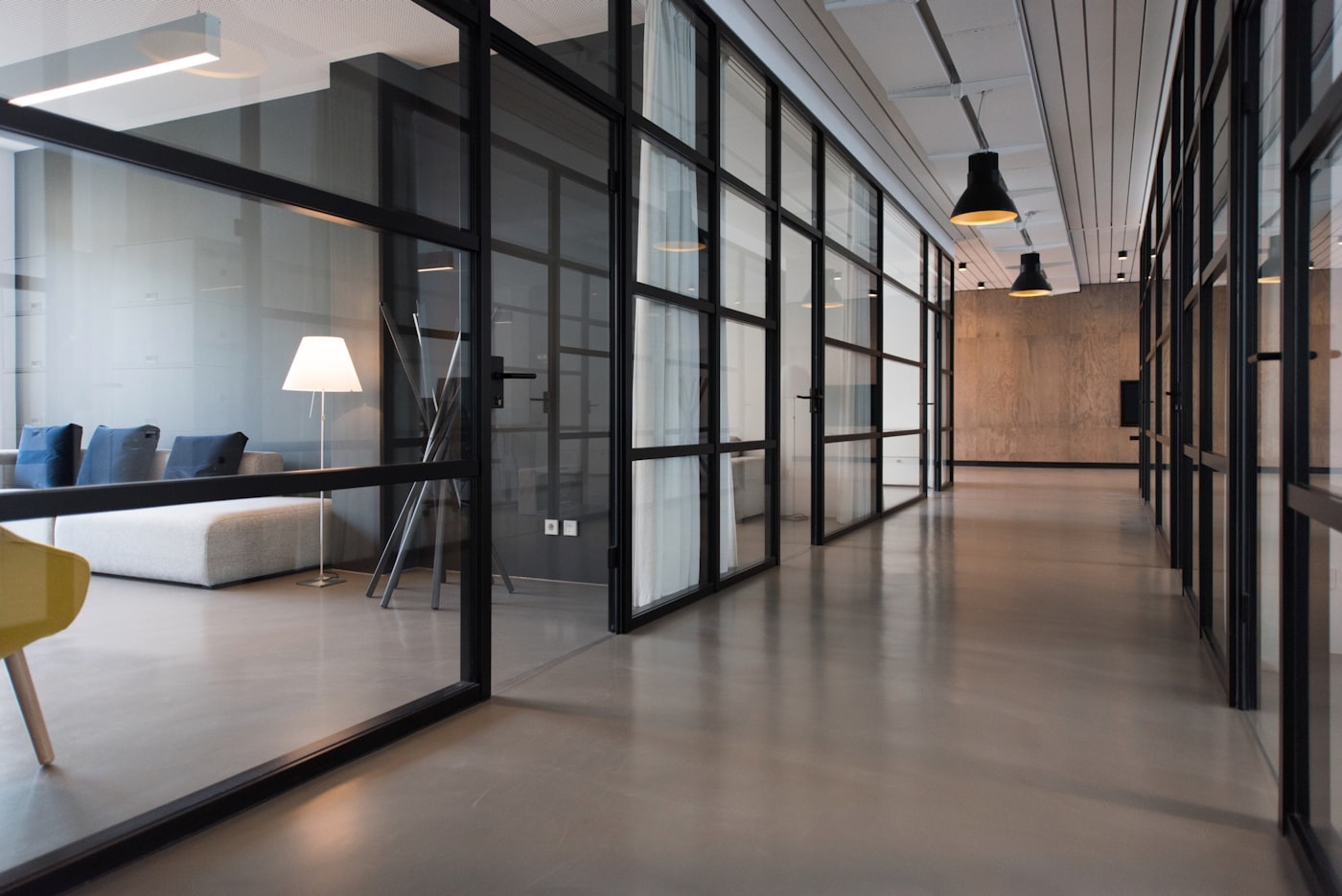 Office corridor with glass partitions